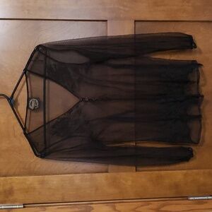 Sheer lace top with loop/button closure and tie back-worn once, vintage.Bin#8